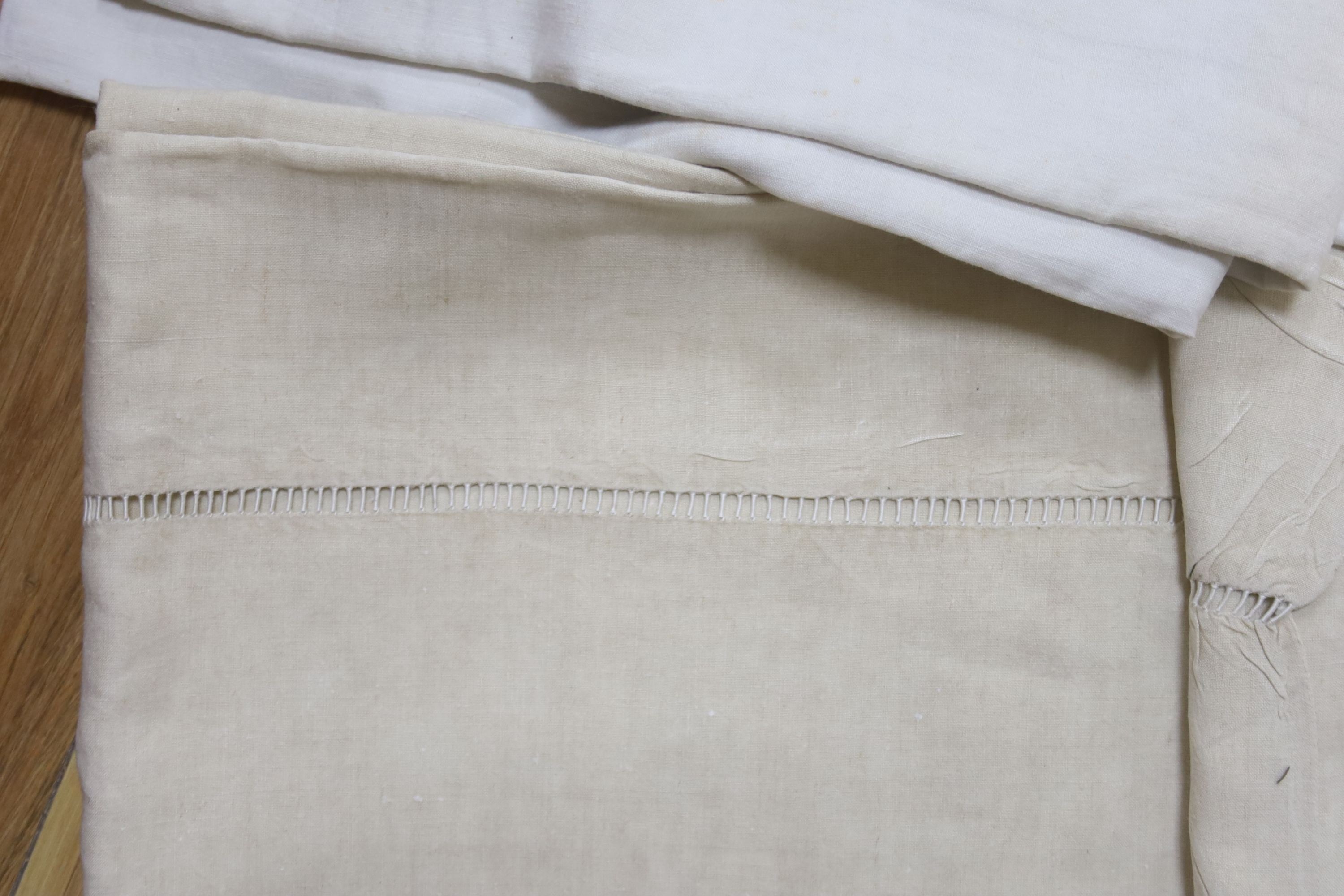 Six French provincial embroidered and cutworked sheets